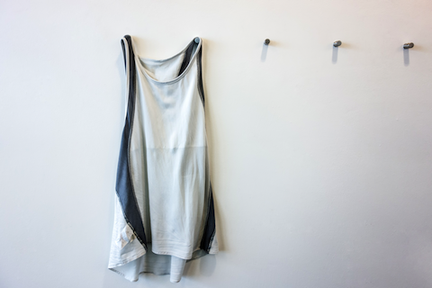 dress hanging up on the wall