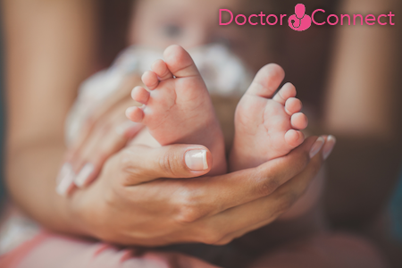 baby feet with the doctor connect logo